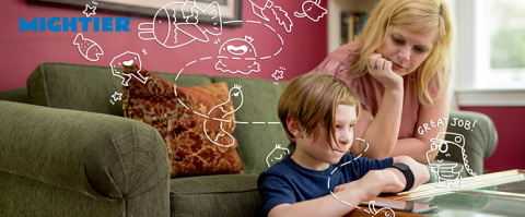 Child and mother at couch and table with technology