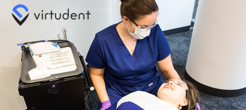 Female hygienist and patient